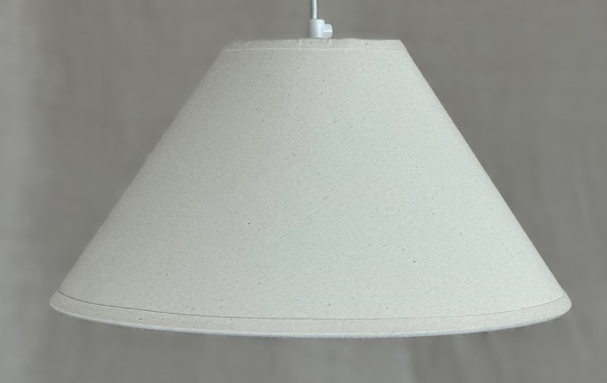 Modern and stylish Lampshade - Coolie - Small - in Natural Cotton with a taped edge and white lining. Ideal for any room. Made to order lampshades